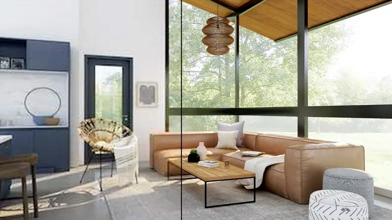Modern living room featuring a tan leather sectional, large windows, and blue cabinetry.