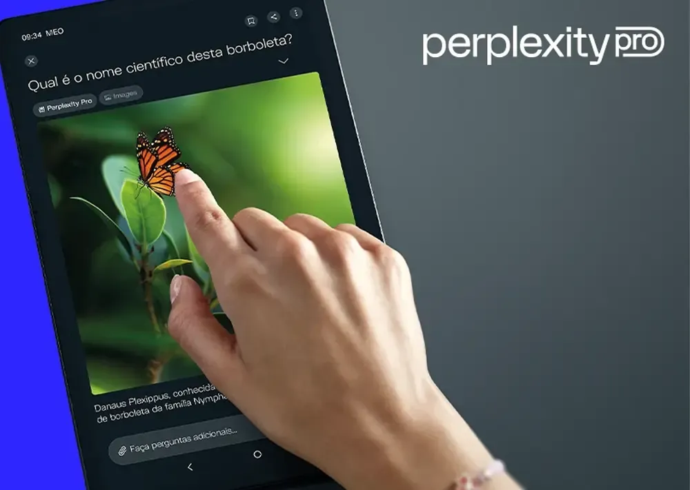 Hand touches tablet displaying a monarch butterfly on a leaf, with a question on screen.
